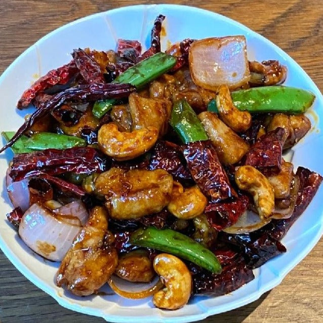 Wok-Fried Chicken Cubes With Cashew Nuts In Kong Po Style